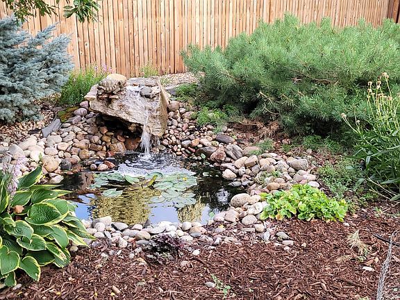 Decorative pond with waterfall.