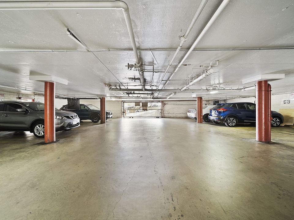 Gated, covered parking area providing convenient and secure resident parking.