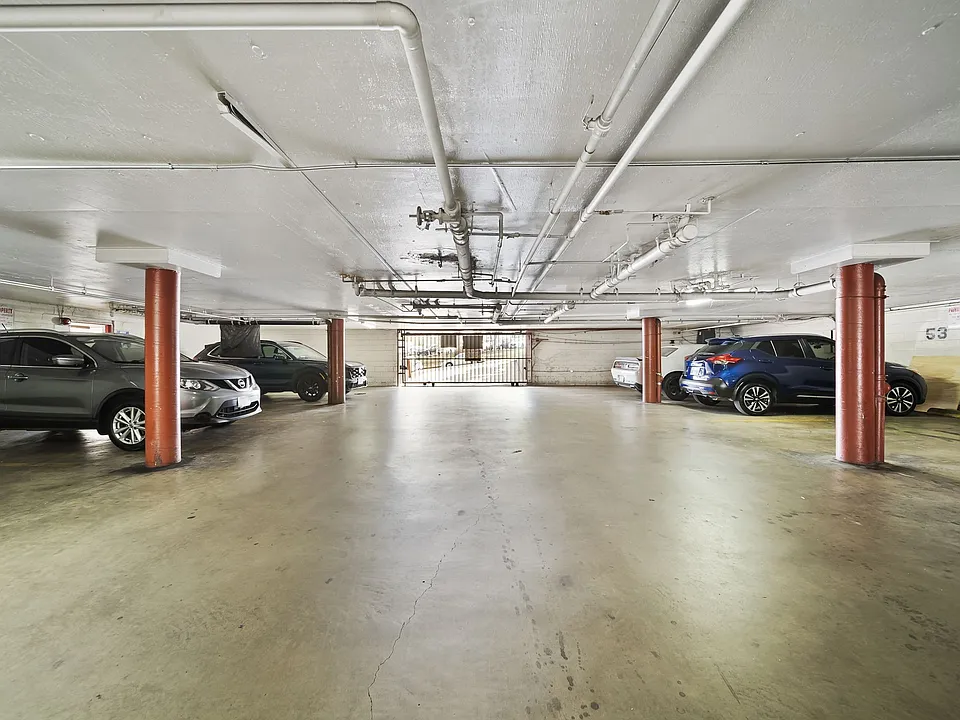 Gated, covered parking area providing convenient and secure resident parking.