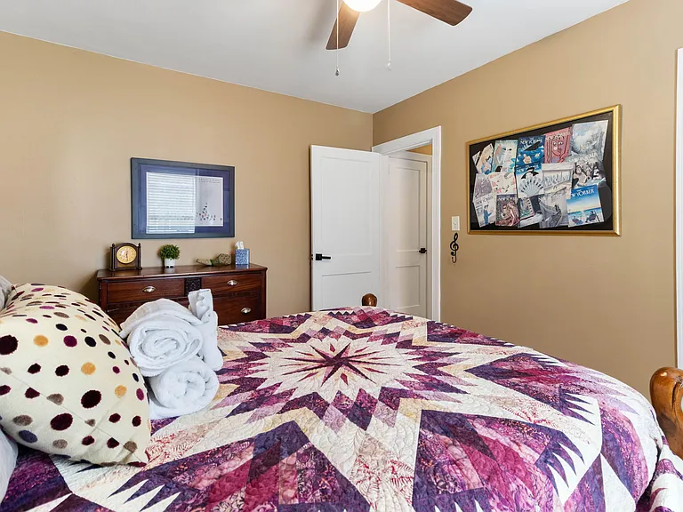 Logan's Room at Hunsucker's Place features a cozy memory foam bed, tasteful decor, and natural light. Located near Downtown Greensboro and Cone Health Hospital, this inviting space offers comfort and convenience in a charming, centrally located home.