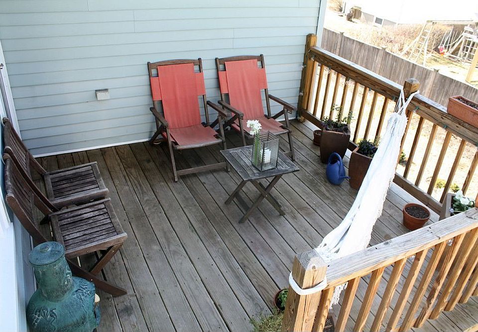 The deck is a private oasis, overlooking the backyard.
