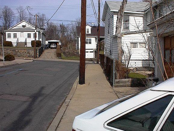 Down street to left