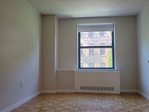 3rd image of 225 E 6th St APT 2D
