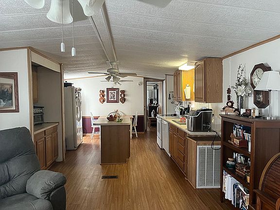 View of kitchen/DR from LR. 
