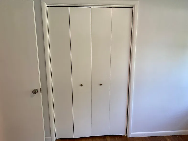 Bedroom 1, facing closed closet