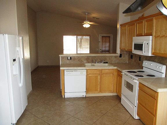 Kitchen with custom back splash