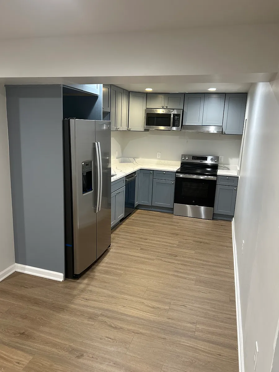 Kitchen with Refrigerator, dishwasher, stove and Microwave - 7918 Sage Way
