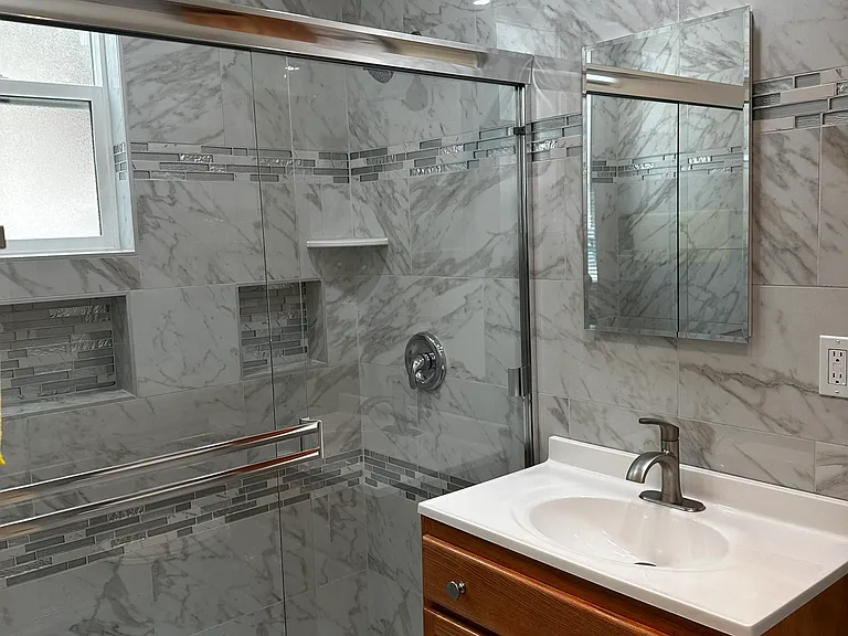 Deluxe Walk In Bathroom

Tile all around the Bathroom,
Niches of Your Toiletry
Clear, Glass Shower Doors
Bathroom Recessed Lights, Heat Lamp, & Fan