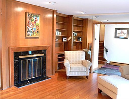 EXPANSIVE LIVING ROOM WITH FIREPLACE