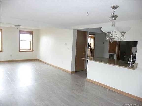 New floors, lots of light, living room/dining room