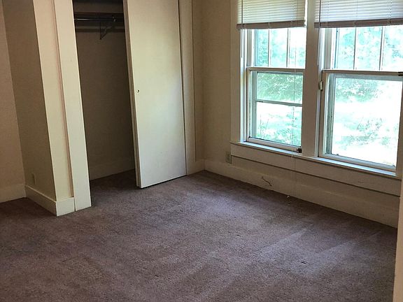 Bedroom with double windows.