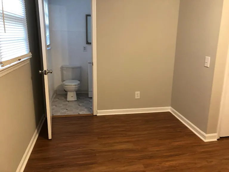 Master bedroom with private half bath.