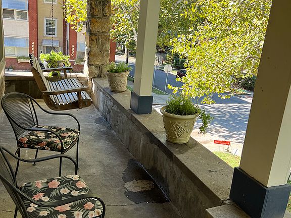 Porch swing, and chairs to enjoy the view