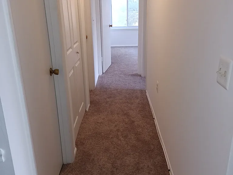 passage with new carpeted area