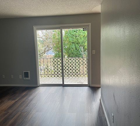 Living Room with view of balcony