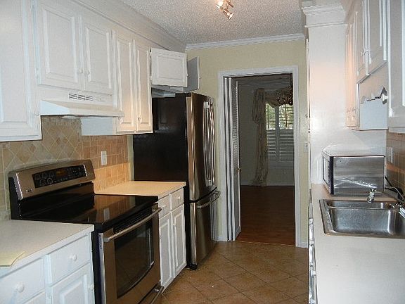 Kitchen with stainless steel appliances