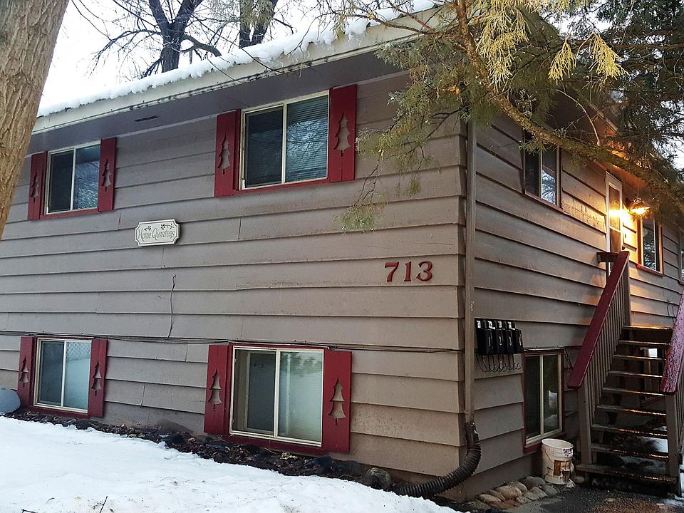 Exterior of building. Parking is in the back. The entry to the apartment to the apartment is in the back side entrance.