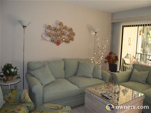 Living room with lots of light from the large sliding windows.