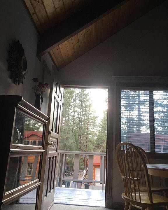 View from recliner out into one of the quietest, deeply forested neighborhoods in the Big Bear Valley. Read a book and listen to neighborhood birds. Tranquility...