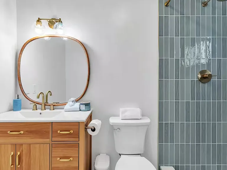 Full Bathroom 1 with a shower