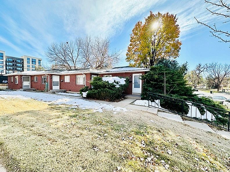 Experience the charm of this cozy brick bungalow nestled in a peaceful neighborhood.