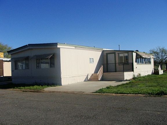 Back of house with porch