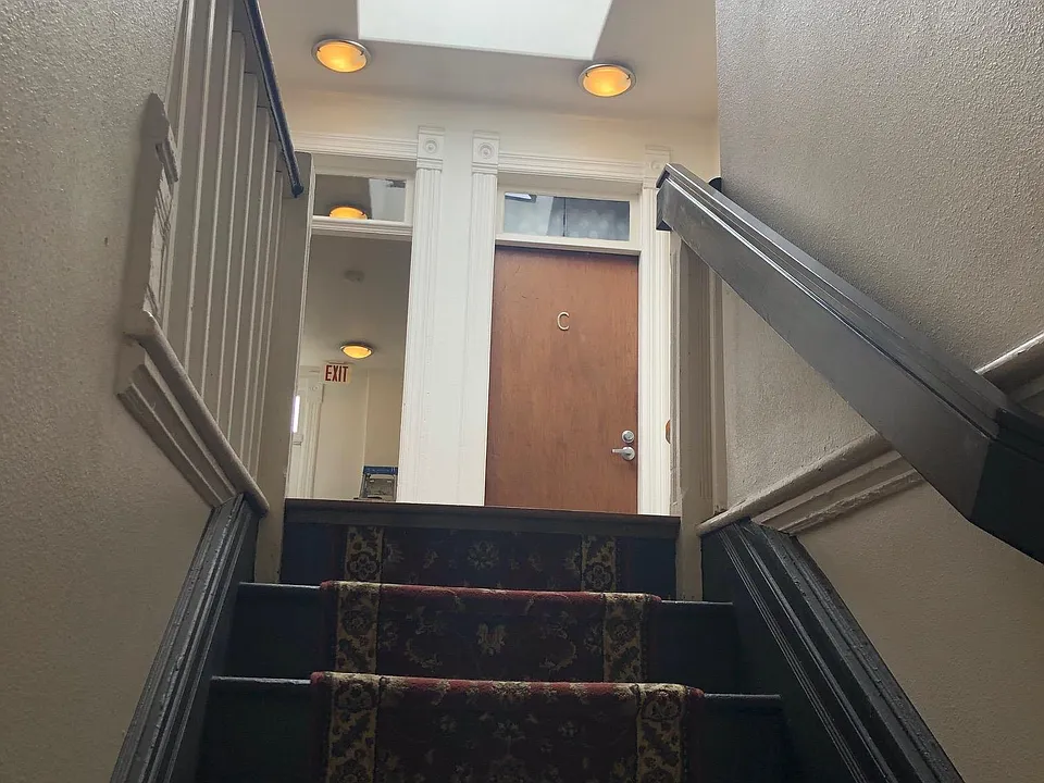 Stairs to second floor behind door 1137