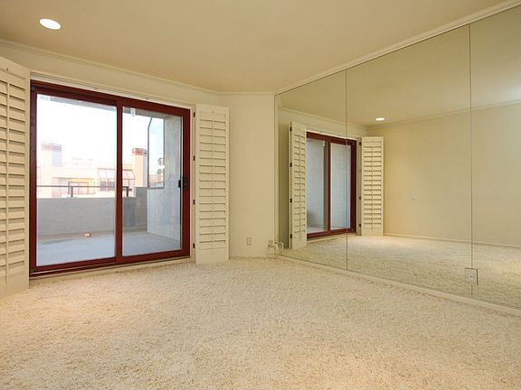 Master bedroom with sliding patio door to deck