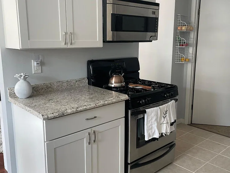 Laundry room/mud room off of kitchen; leads to garage