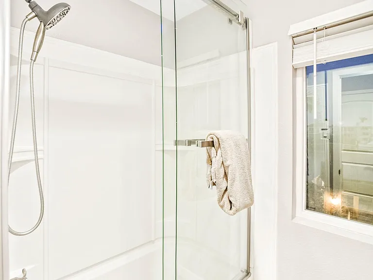 Shower/Tub combo glass doors.