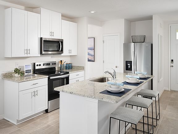 The kitchen of the Denali modeled at Benton Hills.