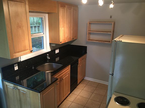 Kitchen - Granite countertops, dishwasher, disposal, butcher block