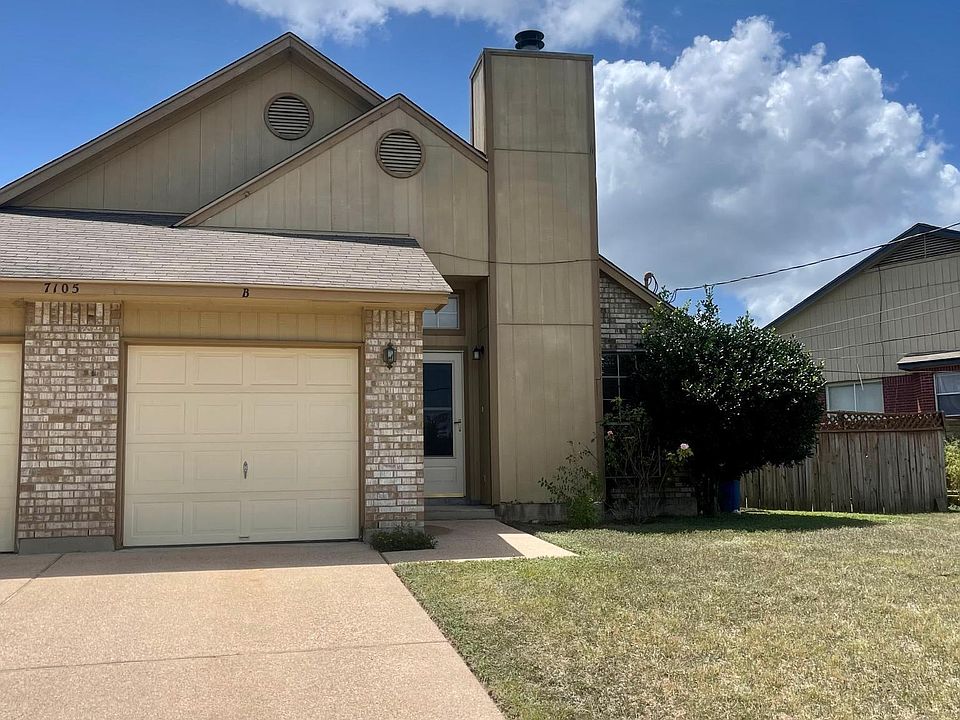 Front with 1 car garage
