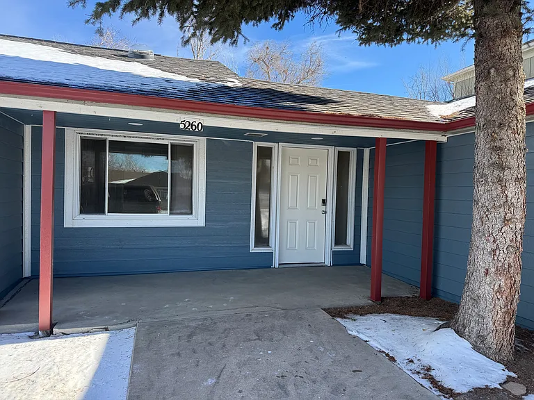 Front entryway (covered) and kitchen window