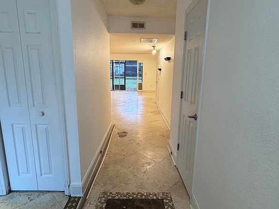 Entry way to a very large living room