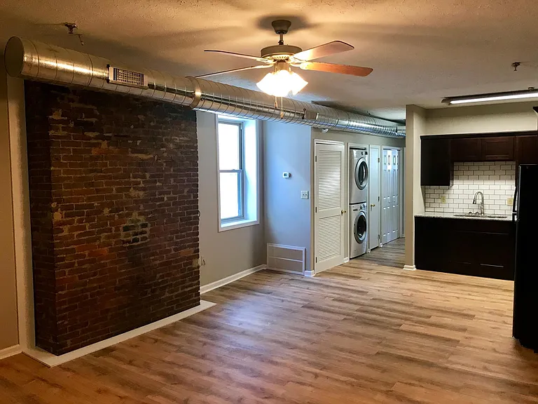 Exposed brick in living room