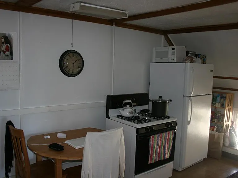 Kitchen flooring replaced with Luxury Vinyl Plank in May 2024.