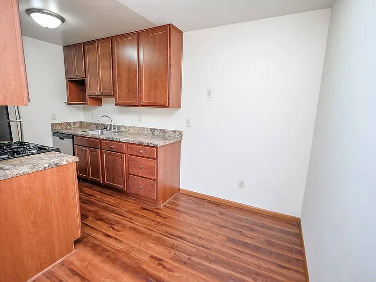 Welcome to Central Lakes of Uptown, where modern kitchen design meets spacious living. Enjoy sleek cabinetry, granite countertops, and warm hardwood floors that create a perfect haven. Schedule a tour today and see your new home!