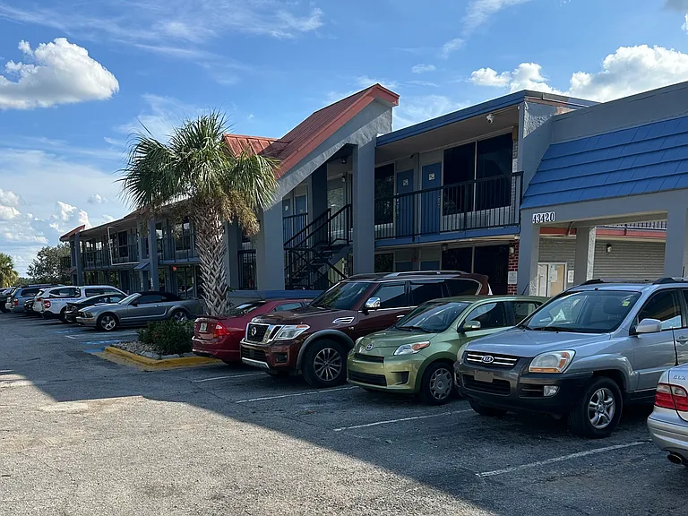 Front view of Tropicanna, the HOA office is by the stairs in the middle.