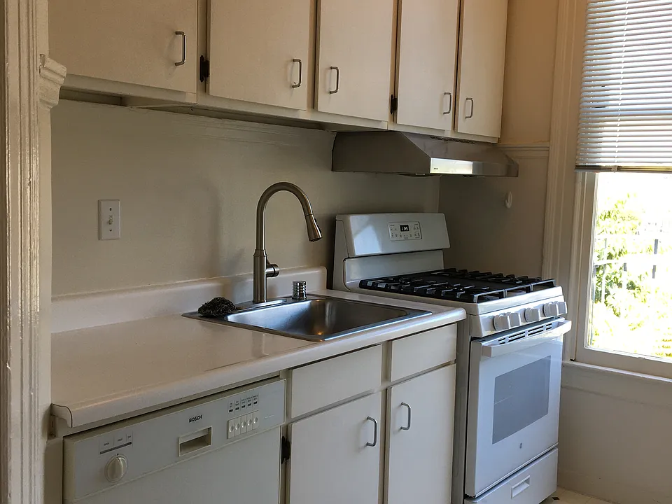Galley Kitchen - lots of storage cabinets - Bosch Dishwasher, new GE Gas stove