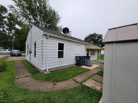 Driveway and back side of house