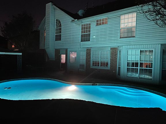 Swimming pool and back yard