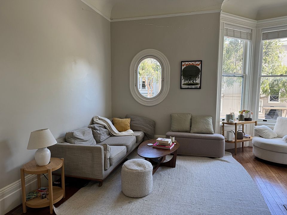 Large light filled front room with captins window and turret