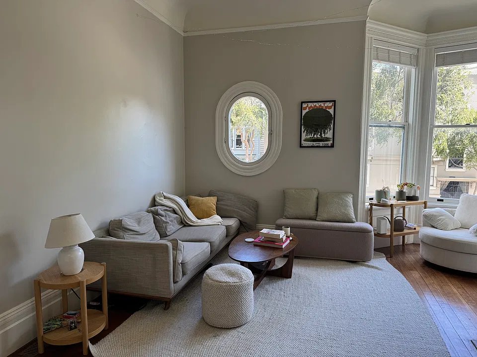 Large light filled front room with captins window and turret