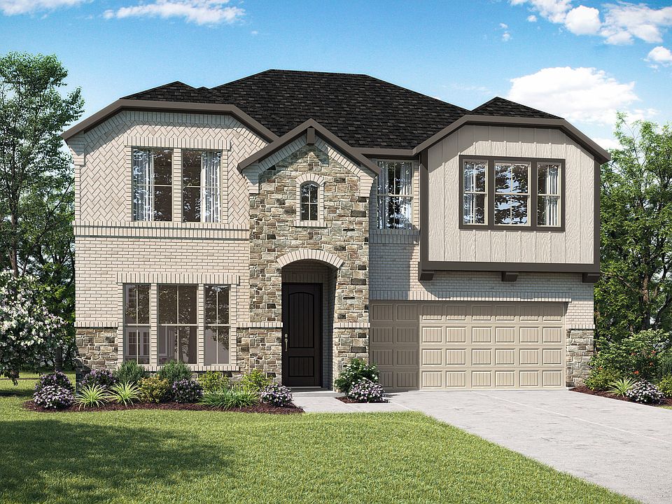 Elevation E is a two story cottage inspired home design with brick and stone featuring an arched ent