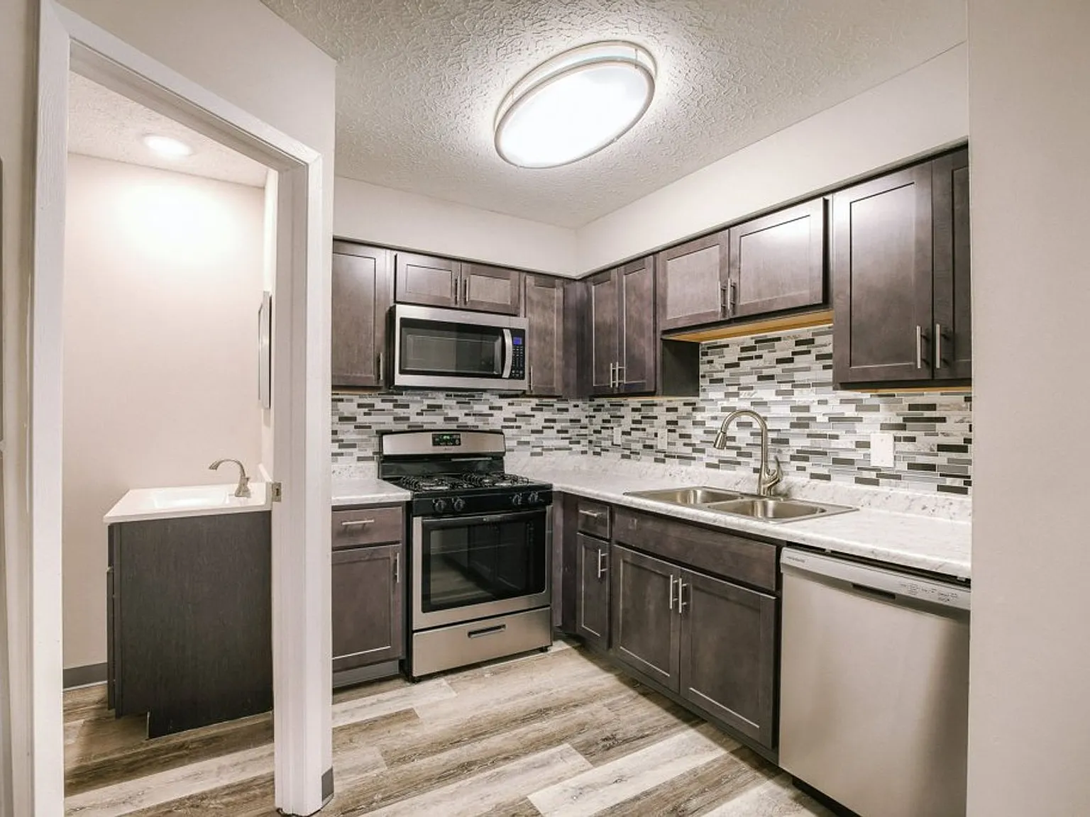 TOWNHOMES AT MCNAUGHTEN — Photo 1