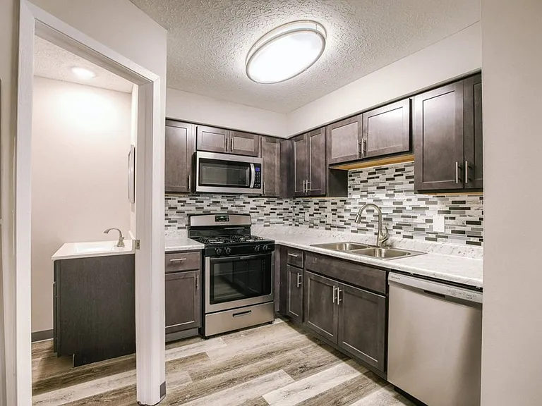 TOWNHOMES AT MCNAUGHTEN — Photo 1