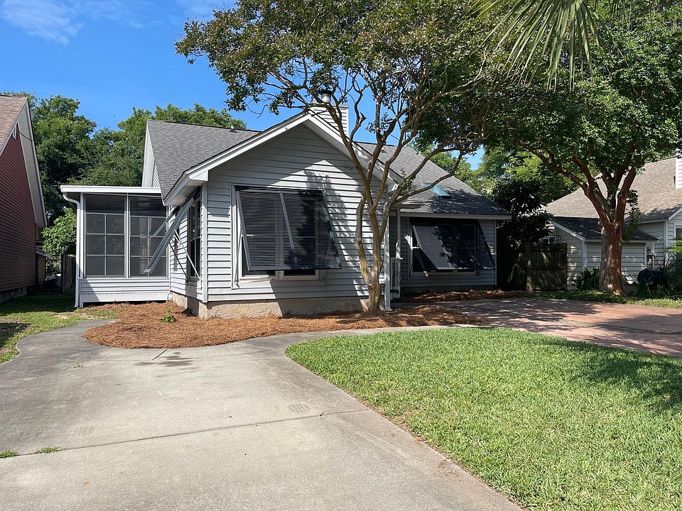 Front of home, left driveway