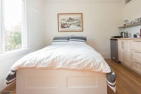 Double bed with all bedding available. Equipped kitchenette. Move in with your personal items.