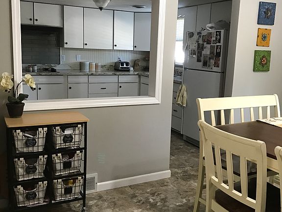 Dining room opens to kitchen